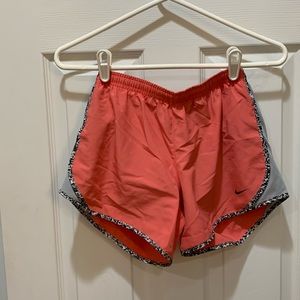 Girls Nike dri fit shorts, large, coral with gray sides, gray built in liner